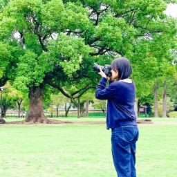 写真：カメラを手にするたまさん