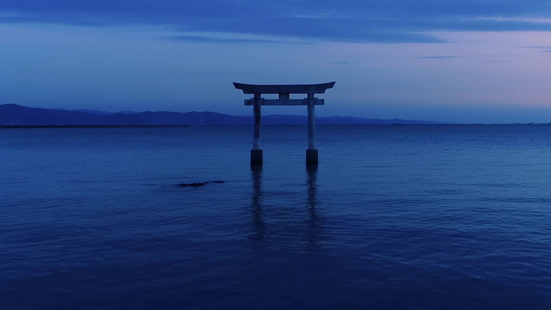 Einoo Tsurugi Shrine torii gate in the sea, Uki